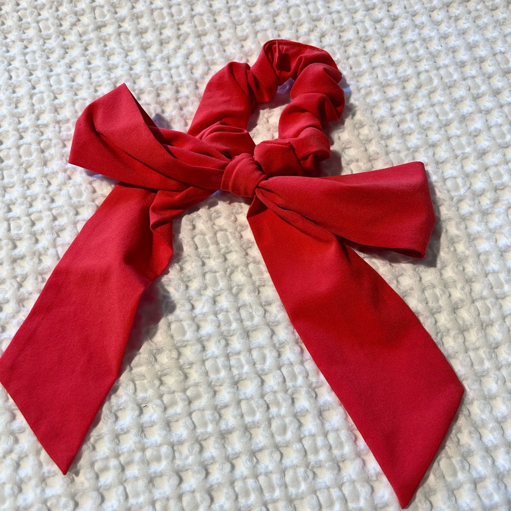 Red Lululemon bow scrunchie